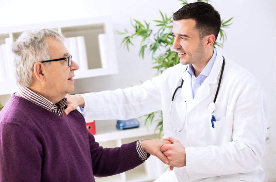A doctor warmly welcoming a patient