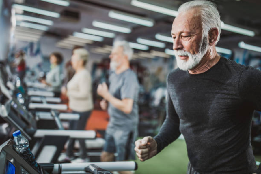 An adult training in the gym as part of a structured program